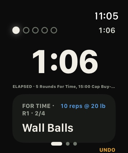 The Apple Watch running a for-time piece: the clock at 1:06, round 1, wall balls, 10 reps at 20 lb
